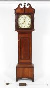 An oak longcase clock, the 11 1/2" painted dial with subsidiary seconds dial and date aperture,