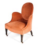 A Victorian armchair, upholstered in pink velvet, with round back and upright arm rests,