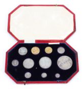 An Edward VII 1902 specimen coin set including a sovereign, half sovereign, crown, half crown,
