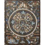 A Tibetan Thangka, painted and gilt with deities within a roundel, on paper, 20th century,