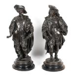 A pair of late 19th century French spelter figures, each wearing 17th century style dress,