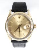 A gold capped Rolex oyster perpetual date wristwatch.