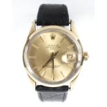A gold capped Rolex oyster perpetual date wristwatch.
