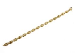 A yellow metal bracelet, belived to be 18ct but not tested,