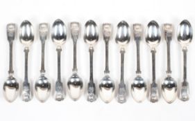 A set of twelve late Victorian silver Kings pattern tea spoons,