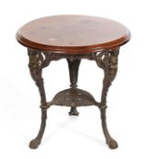 A mahogany topped pub table, the bronzed tripod base cast with Britannia,