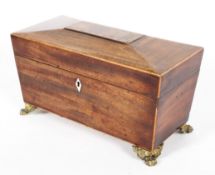 A George III mahogany gilt-metal mounted tea caddy, of sarcophagus form,