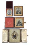 A pair of Victorian daguerotypes of young girls, in gilt frames and leather bound cases; another,