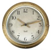 A Mercer brass ships clock, mid-century, with silvered dial and Arabic numerals,