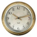 A Mercer brass ships clock, mid-century, with silvered dial and Arabic numerals,