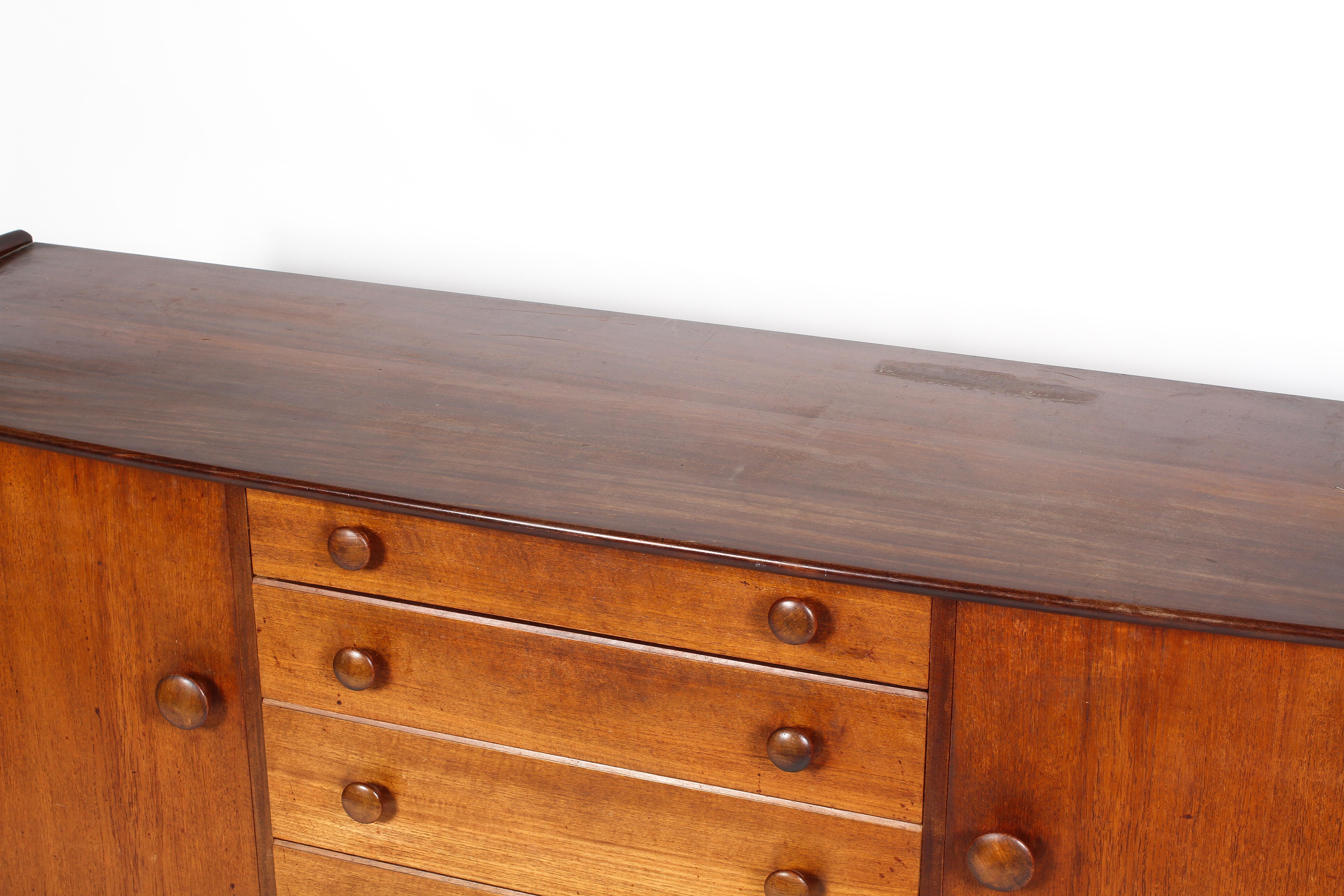 A mid century teak sideboard, with four central graduated short drawers, - Image 2 of 3