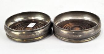 A pair of Elizabeth II silver decanter coasters, hallmarked London 1973 by Chick & Sons Ltd,