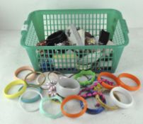 A selection of costume jewellery, including a range of colourful bangles and necklaces