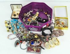 A selection of costume jewellery, including pairs of cufflinks, bracelets, earrings,