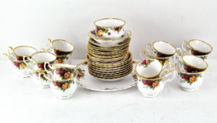 A Royal Albert 'Old Country Roses' part tea service, including cups and saucers, sugar bowl,