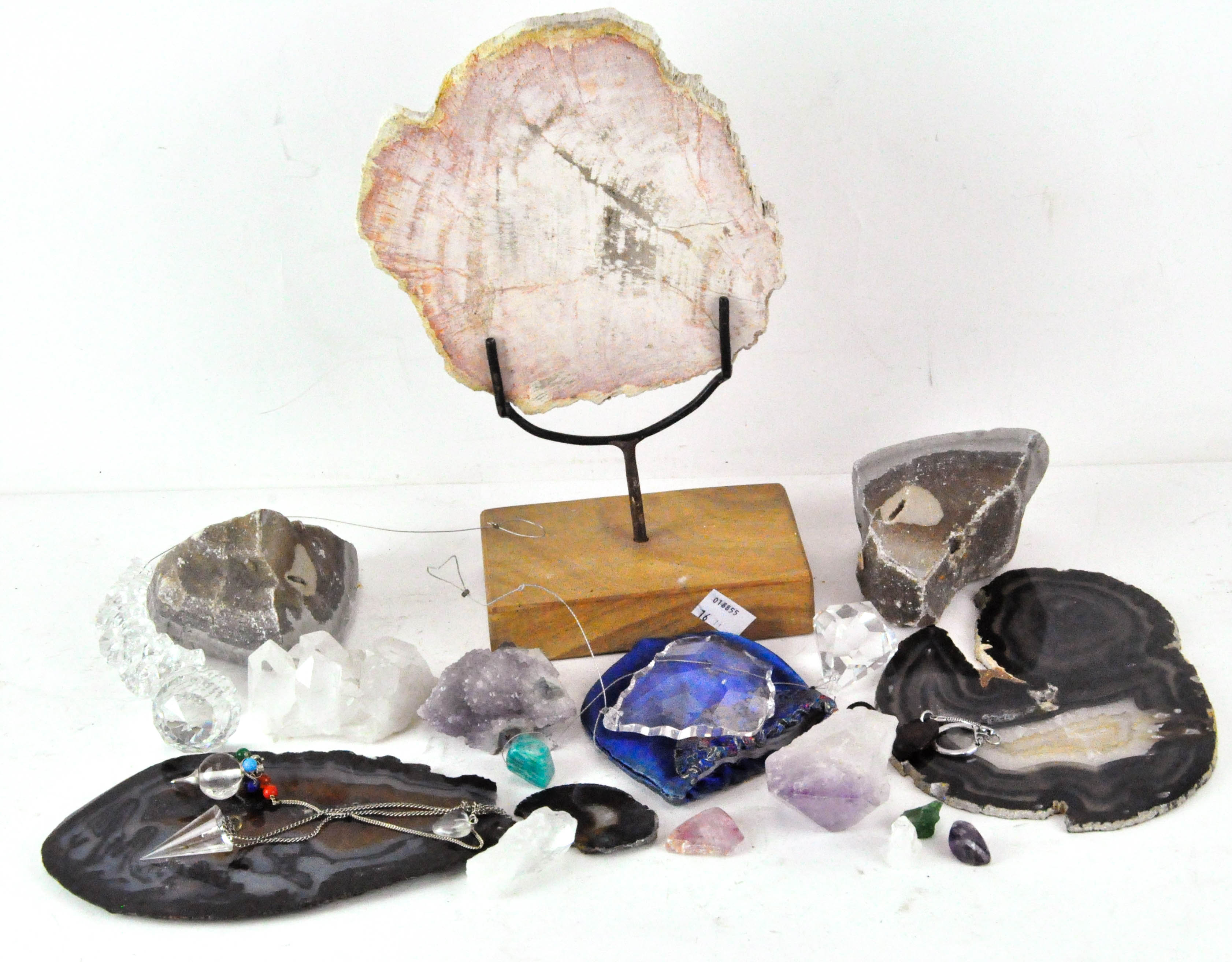 A collection of minerals and geodes, including quartz,