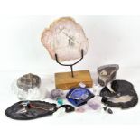 A collection of minerals and geodes, including quartz,