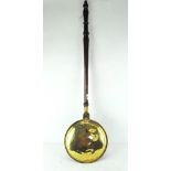 A late 19th century copper warming pan, with mahogany handle,