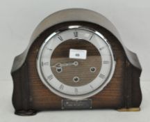 A 20th century oak mantel clock,