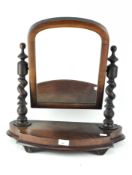 A Victorian mahogany dressing table mirror, with flanking barley twist supports,