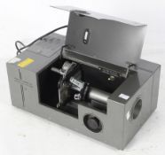 A Philip Harris Ltd projecting electronic microscope, 240V, 50Hz, in a fitted metal case,