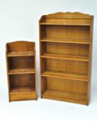 Two mid-century bookcases of three and four shelves,