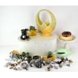 A collection of assorted Sylvac, including a dog figure, model of shoes, vases and more,