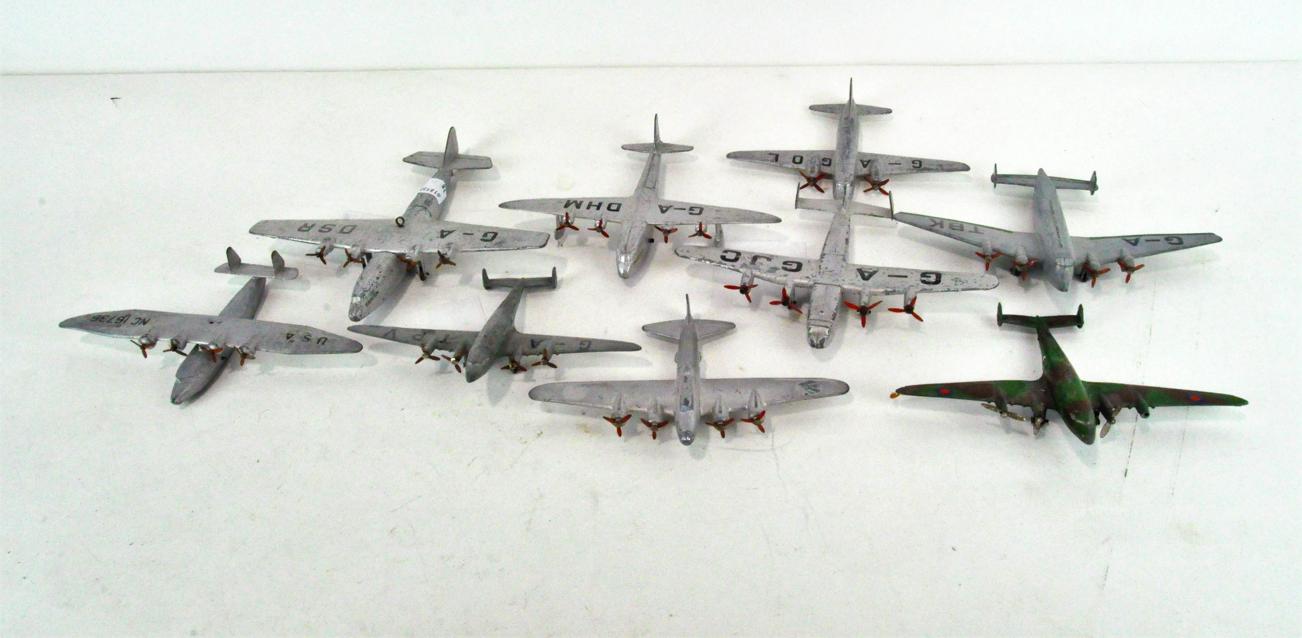 Nine Dinky diecast model aircraft