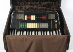 A black Farfisa Transivox electric piano accordion, model TX11M, serial no.