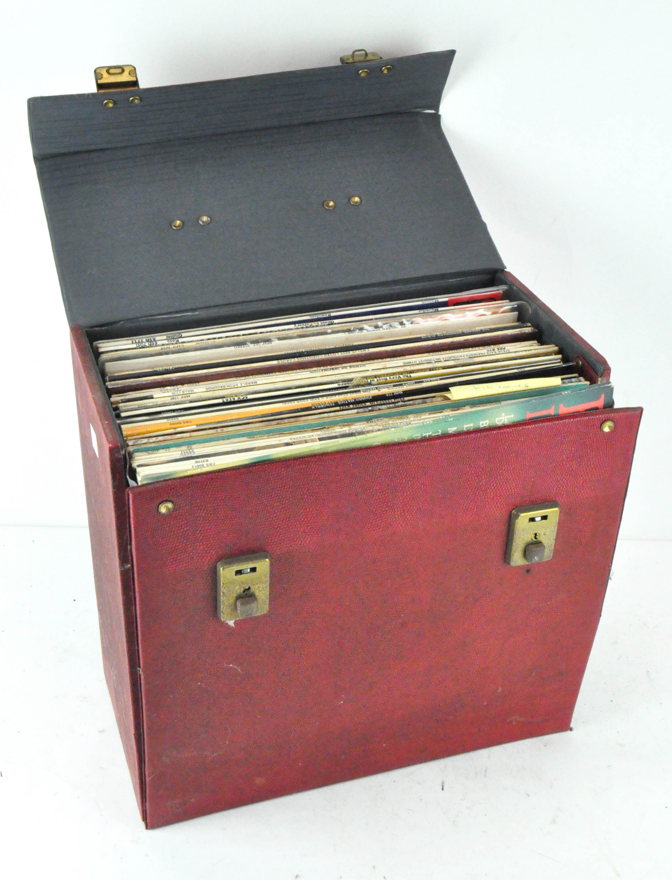 A selection of vinyl records, including Hymns, Christmas hits,