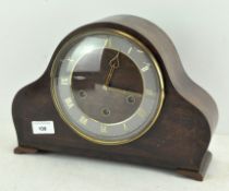 A 20th century mantel clock, with bevelled glass front,