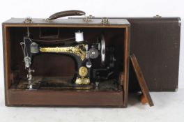 A Singer 128 hand crank sewing machine, EC363280, with gilt decoration,