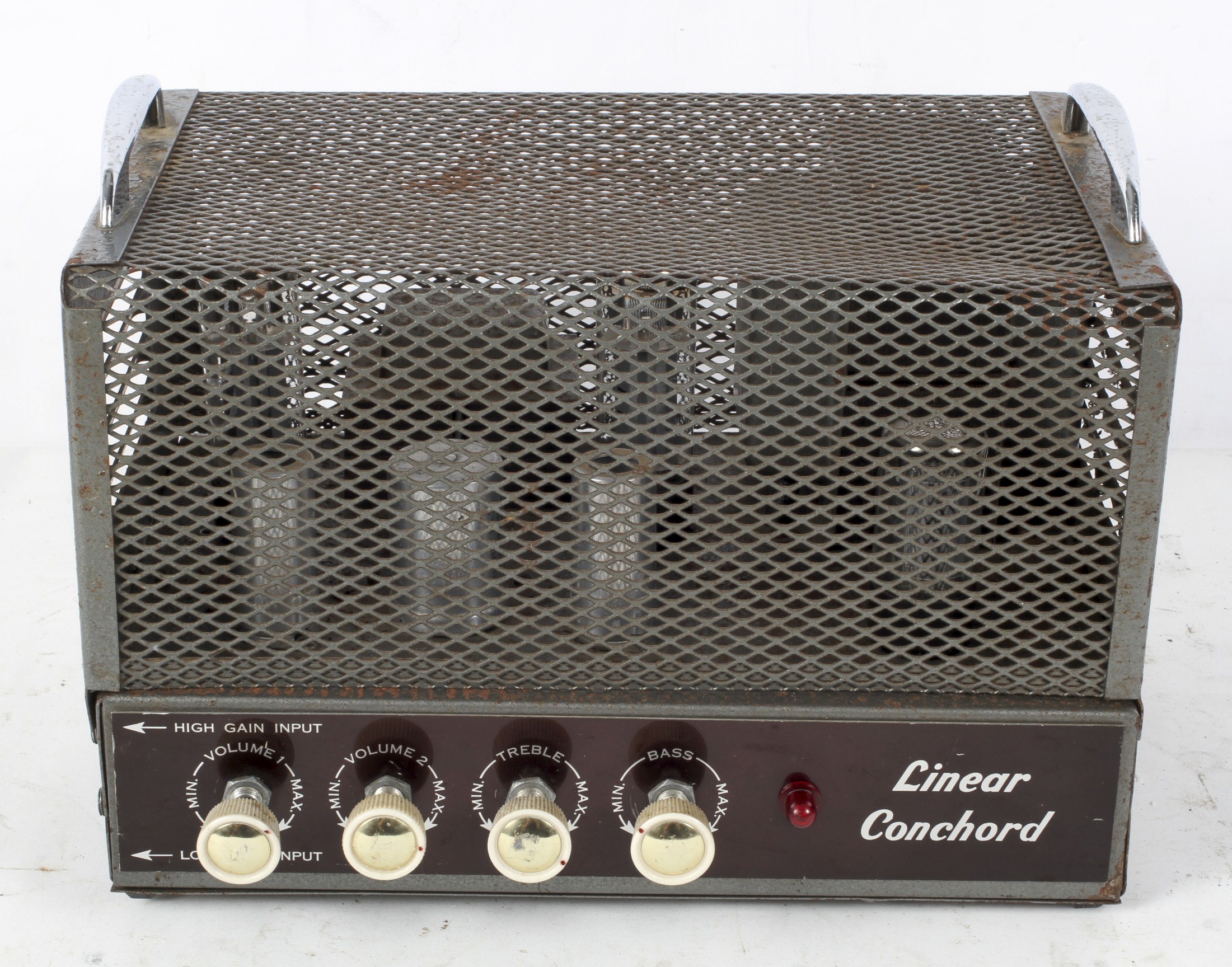 A 1960's Linear Conchord amplifier, 30 ohms, four dials to the front, within a metal case,