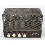 A 1960's Linear Conchord amplifier, 30 ohms, four dials to the front, within a metal case,