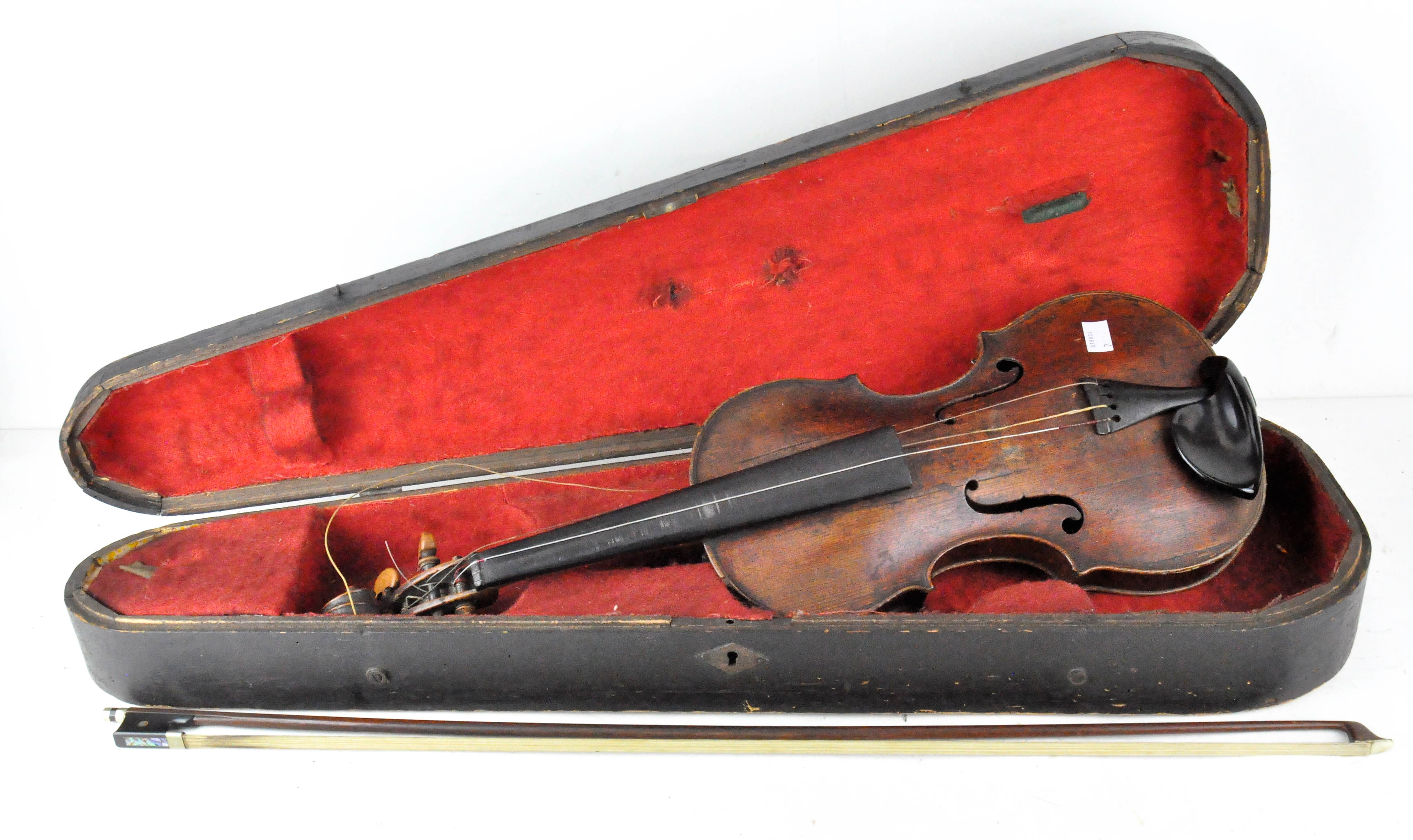 An early 20th century violin, with bow,