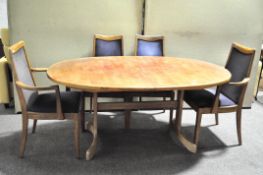 A G Plan oval dining table, 73cm x 160cm x 106cm, and four blue upholstered chairs