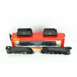 A boxed OO gauge Hornby locomotive together with two unboxed locomotives