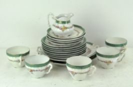 A Berlin style part tea service, printed KPM marks, circa 1890, comprising two serving plates,