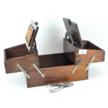 A mahogany concertina action sewing box, with handle to the top,