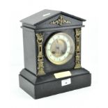 A late 19th/early 20th Century French slate mantel clock of architectural form,