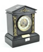 A late 19th/early 20th Century French slate mantel clock of architectural form,