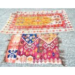 Two colourful Pakistani rugs,