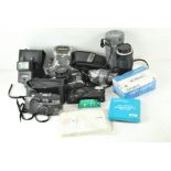 A collection of vintage cameras, comprising a Minolta Vectis 100BF, boxed,