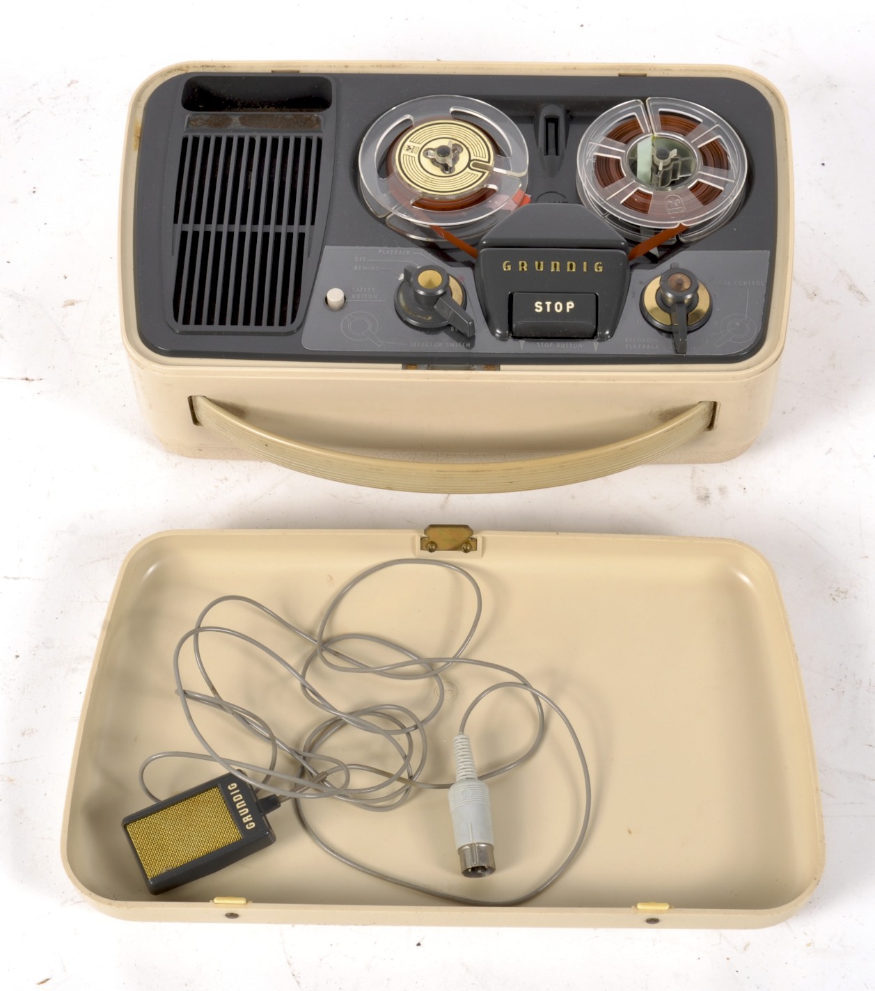 A vintage Grundig Travel reel to reel recorder, together with the plugs and wires,