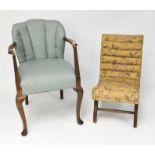 Two early 20th century chairs, one being shell shaped, both with floral upholstery,