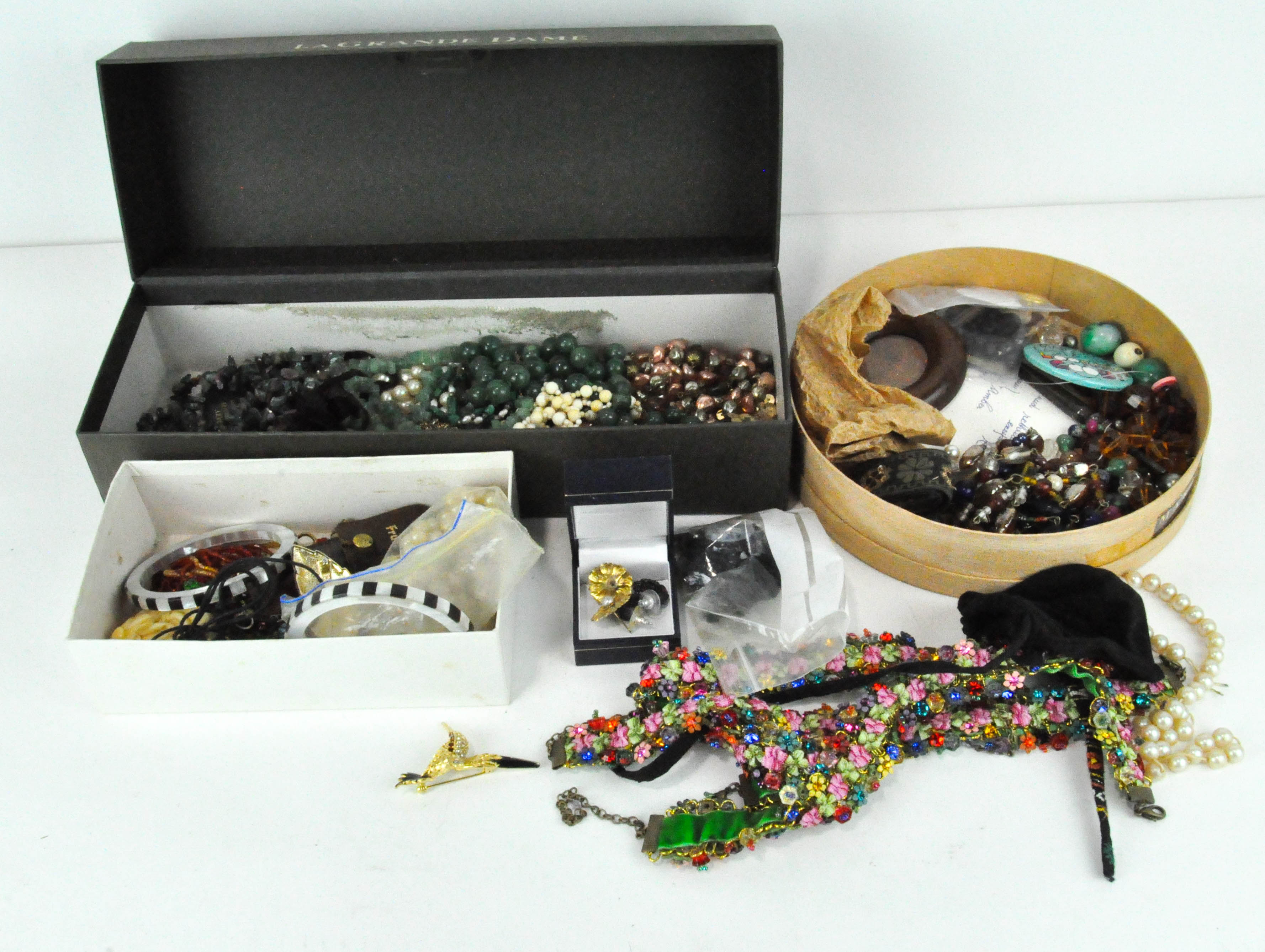 A large selection of costume jewellery, including beads, necklaces, brooches and more