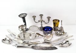 A quantity of 19th & 20th Century silver plate, including candlesticks, flatware, beakers,