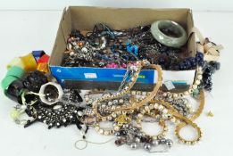 A selection of costume jewellery, including bangles, necklaces, bracelets, earrings,