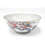 A 19th century Chinese famille rose bowl decorated with branches of lychee,