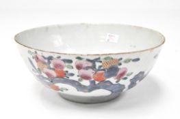 A 19th century Chinese famille rose bowl decorated with branches of lychee,